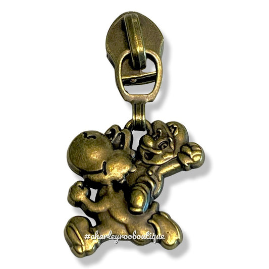 Zipper Pull, Gamer Duo, Guy on Dino, Antique Brass