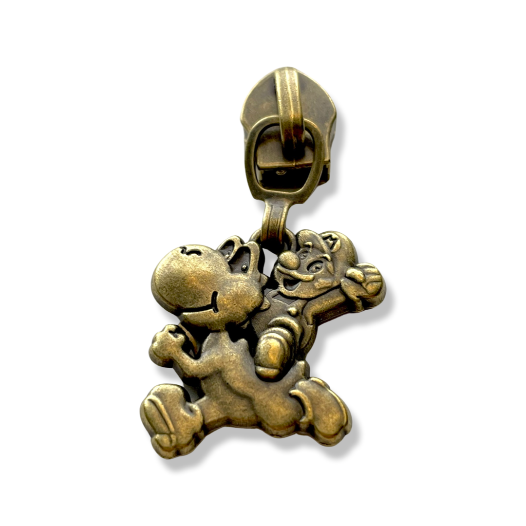 Zipper Pull, Gamer Duo, Guy on Dino, Antique Brass